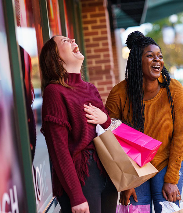 Two women shopping at the Streets of St. Charles